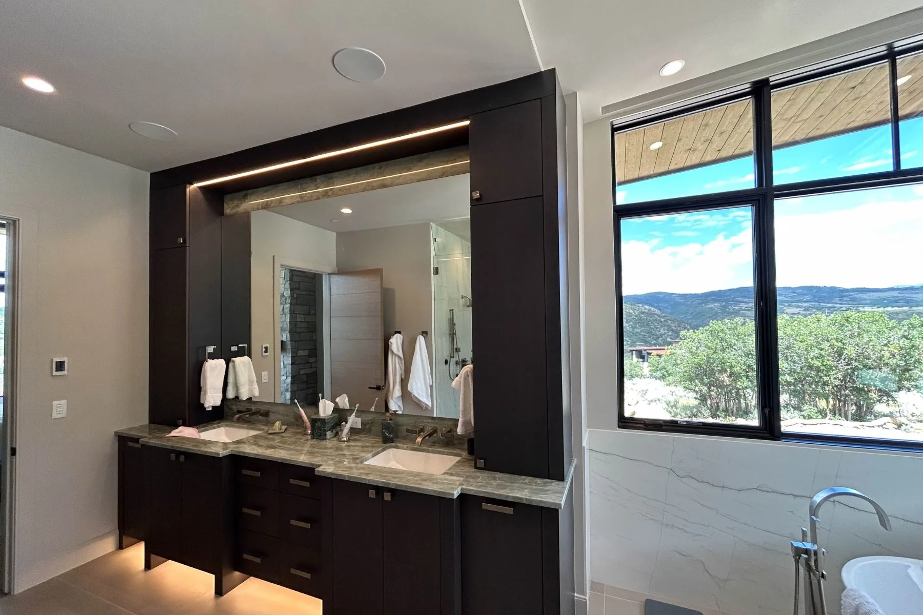 Powered Up Inc. electrician working on a Salt Lake Valley home