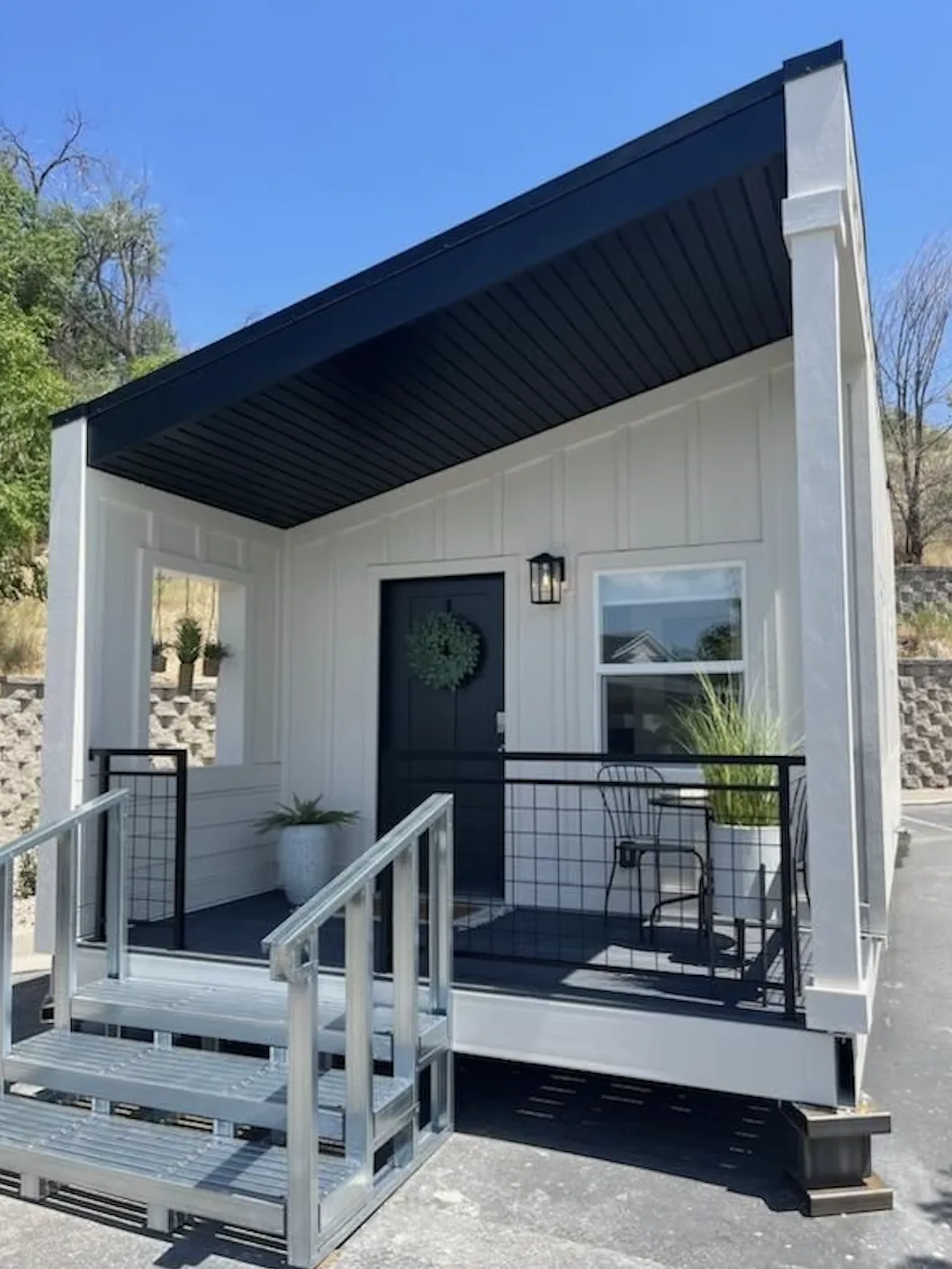 A finished tiny home built through the HomeAid Utah Other Side Village Build Shift project